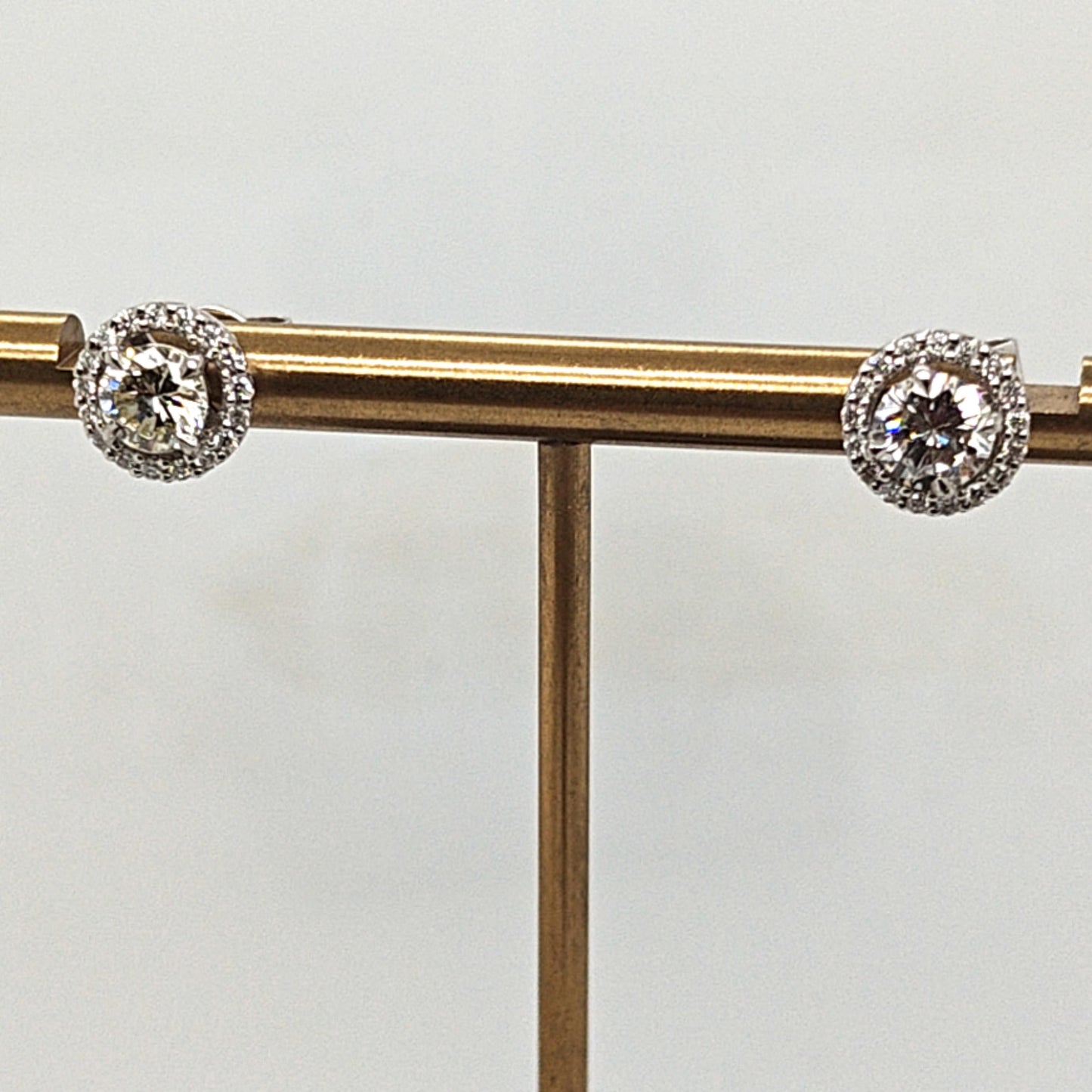 DIAMOND STUD EARRINGS 0.55CT EACH WITH DIAMOND HALOS