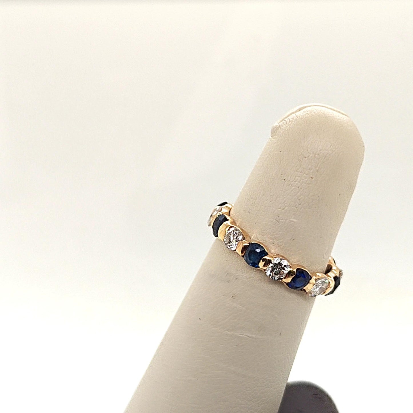 DIAMOND AND SAPPHIRE ETERNITY BAND RING YELLOW GOLD
