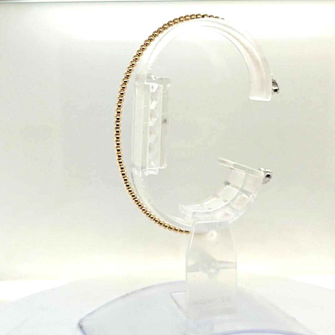 FLEXIBLE BEAD BANGLE CUFF BRACELET WITH DIAMOND HEART ENDS YELLOW GOLD