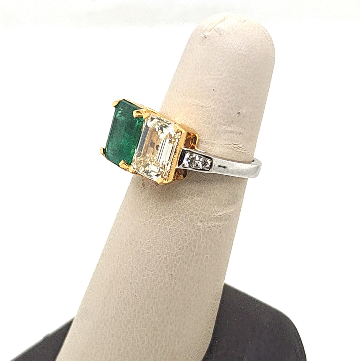 DIAMOND AND EMERALD PLATINUM AND YELLOW GOLD RING