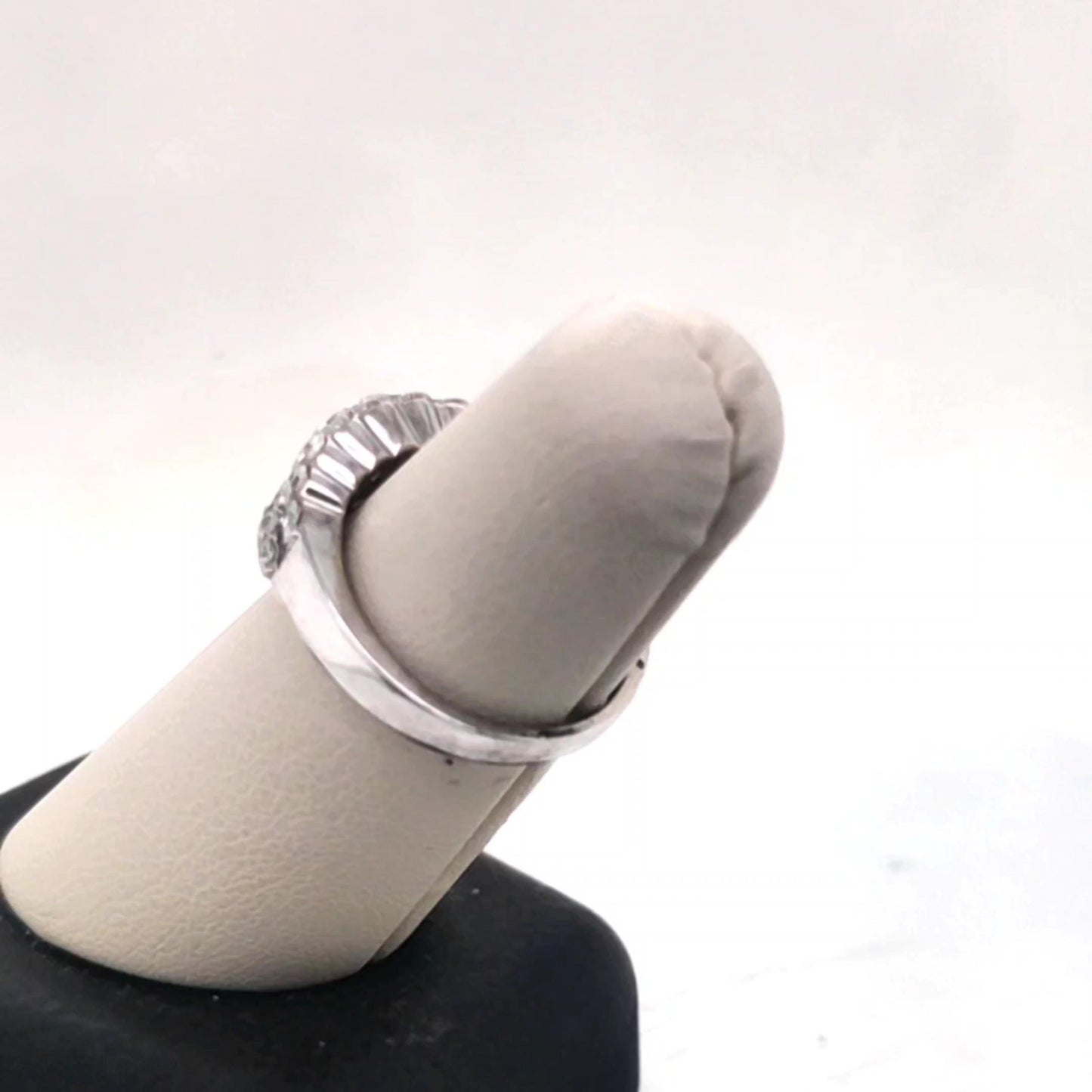 Diamond ring 14WG band with Baguette center and rounds on the sides 1.15CTW