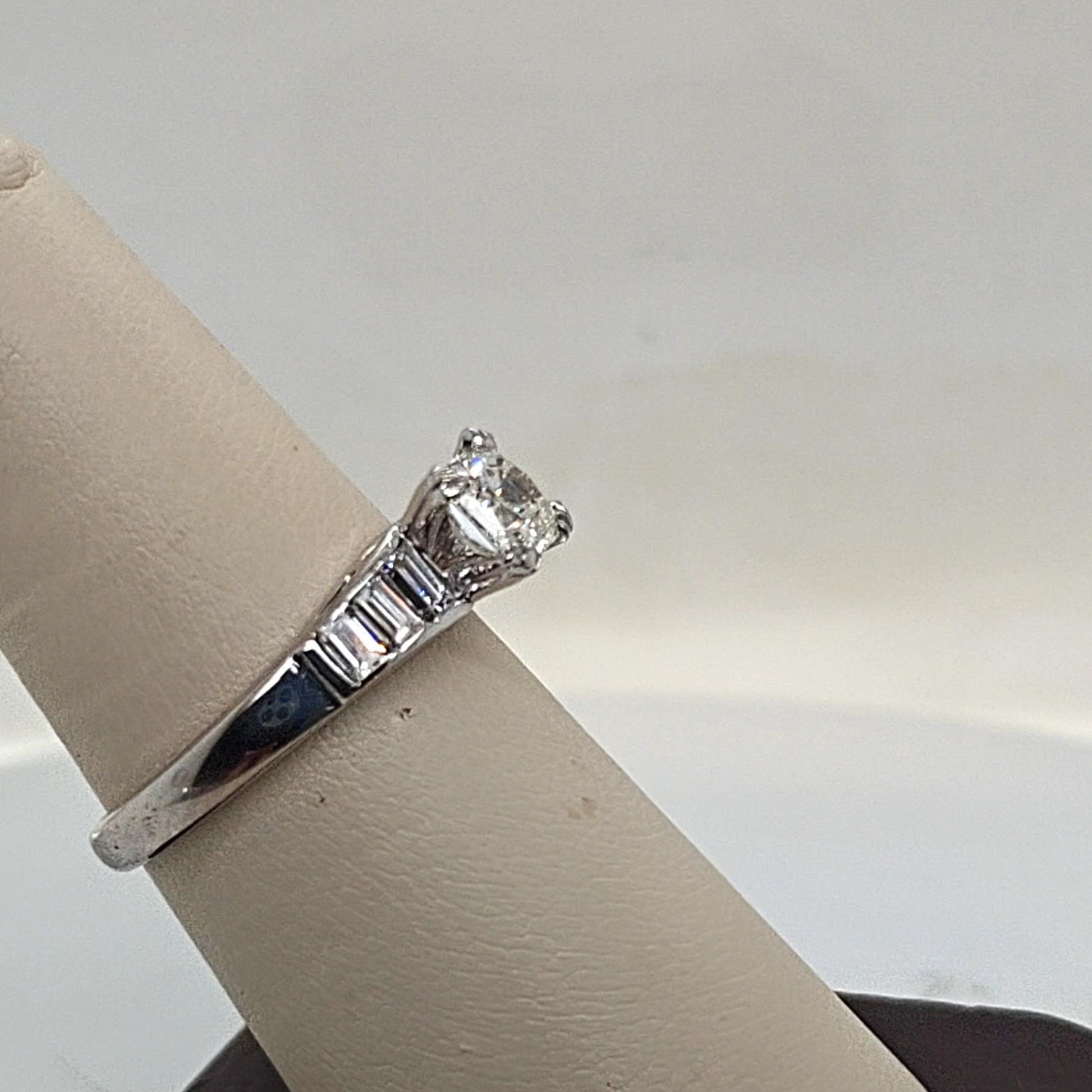 EMERALD CUT 1.01CT DIAMOND RING WITH 6 EMERALD CUT ACCENT DIAMONDS PLATINUM