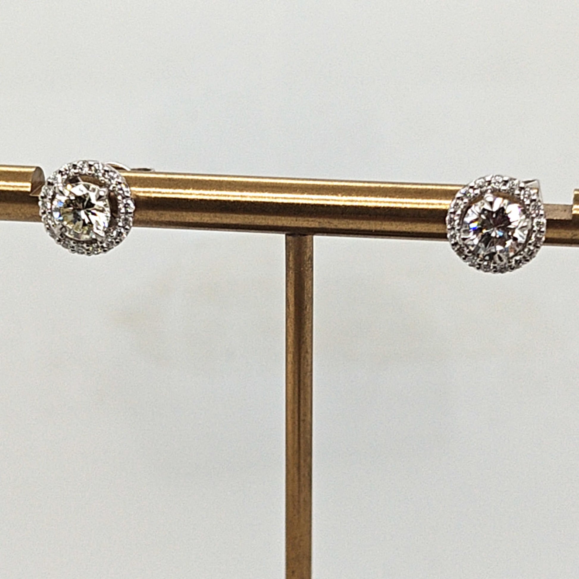 DIAMOND STUD EARRINGS 0.55CT EACH WITH DIAMOND HALOS