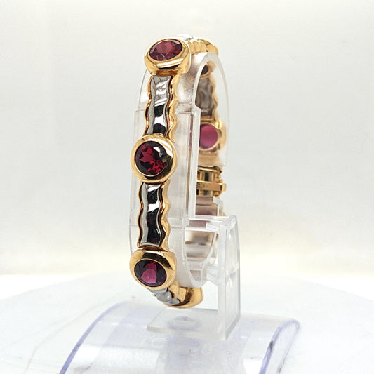 GARNET BRACELET IN TWO TONE GOLD