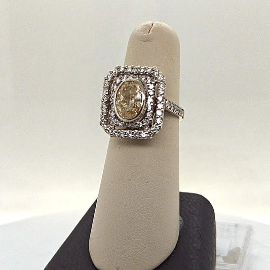 DIAMOND RING LIGHT FANCY YELLOW OVAL 2.68CT WHITE GOLD