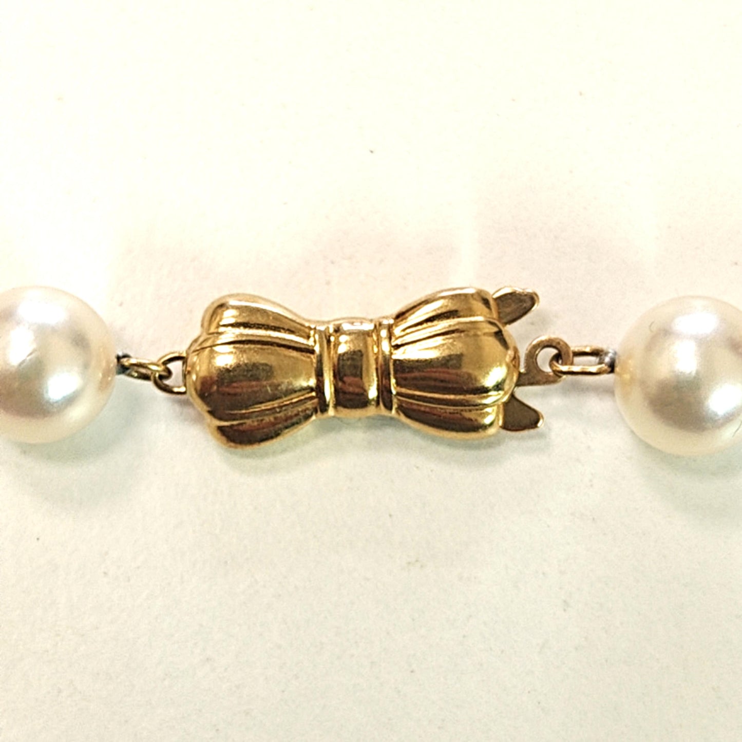 MIKIMOTO 7.5-8MM PEARLS SINGLE STRAND WITH 18KT YELLOW GOLD CLASP