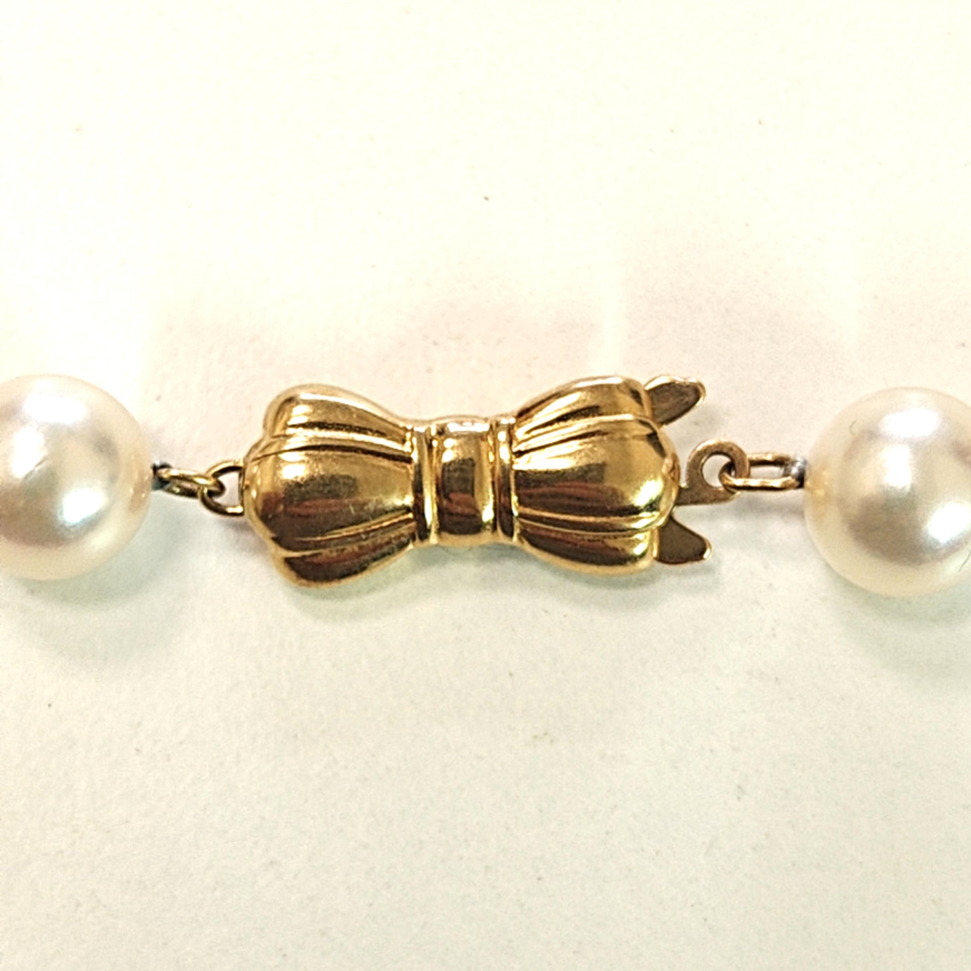 MIKIMOTO 7.5-8MM PEARLS SINGLE STRAND WITH 18KT YELLOW GOLD CLASP