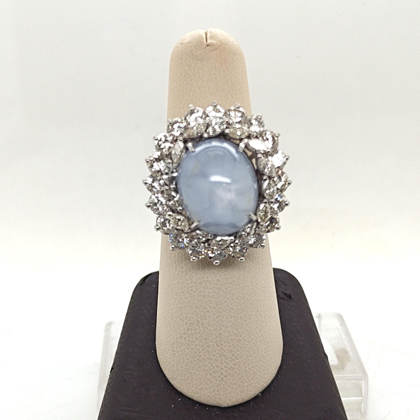 CABOCHON STAR SAPPHIRE AND DIAMOND CLUSTER RING PLATINUM