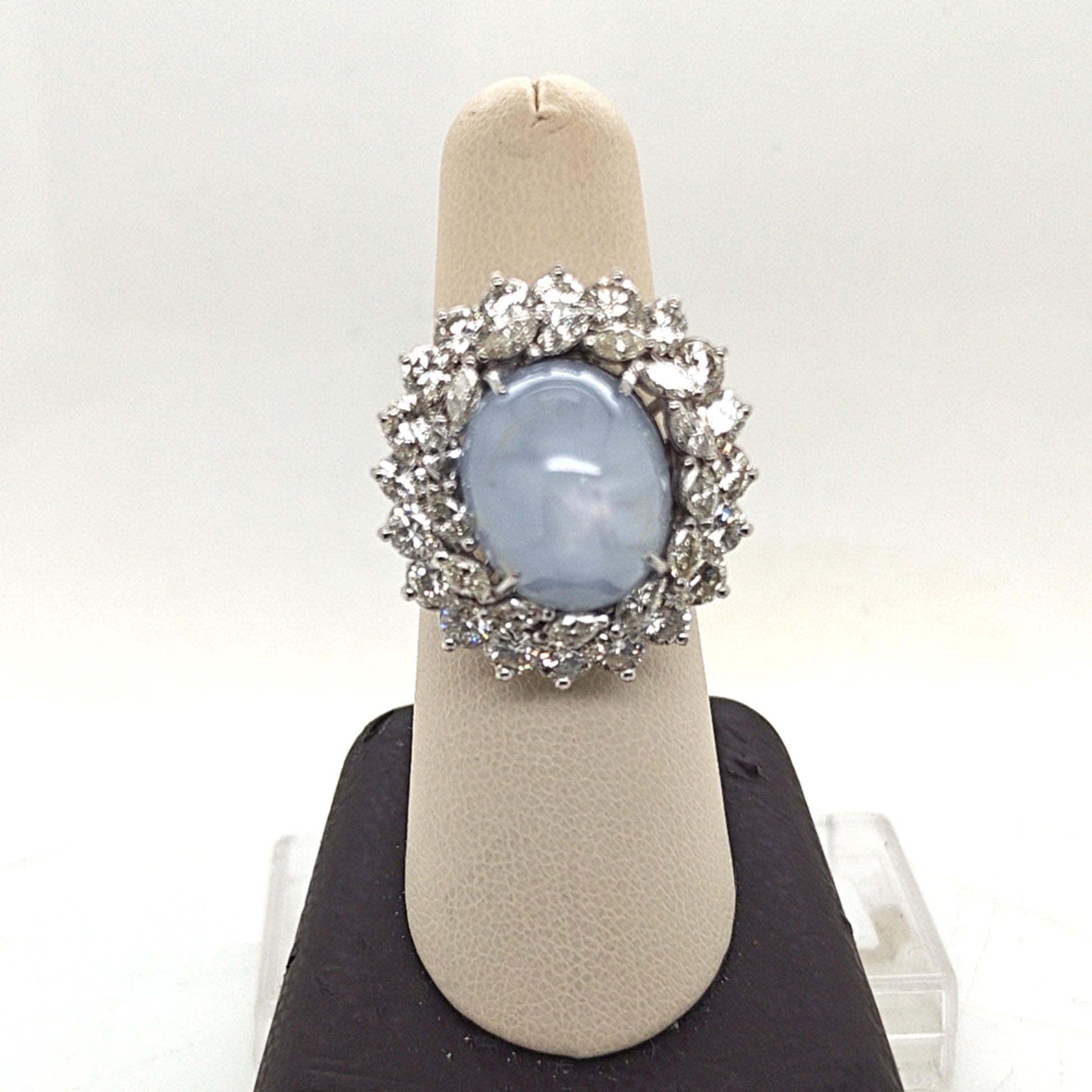CABOCHON STAR SAPPHIRE AND DIAMOND CLUSTER RING PLATINUM