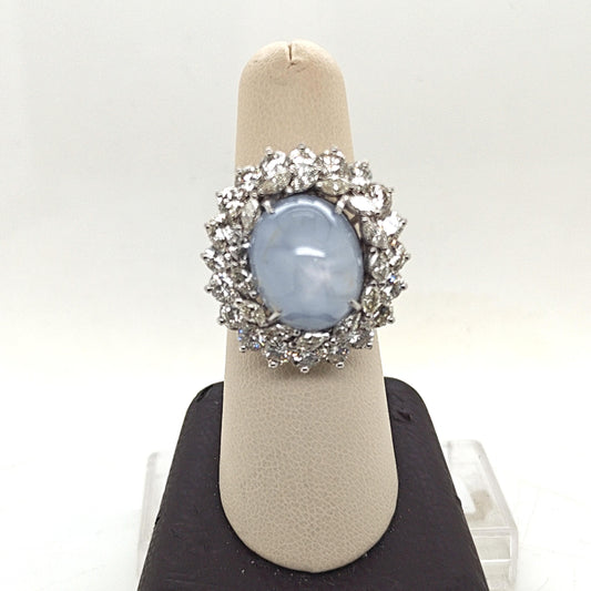 CABOCHON STAR SAPPHIRE AND DIAMOND CLUSTER RING PLATINUM
