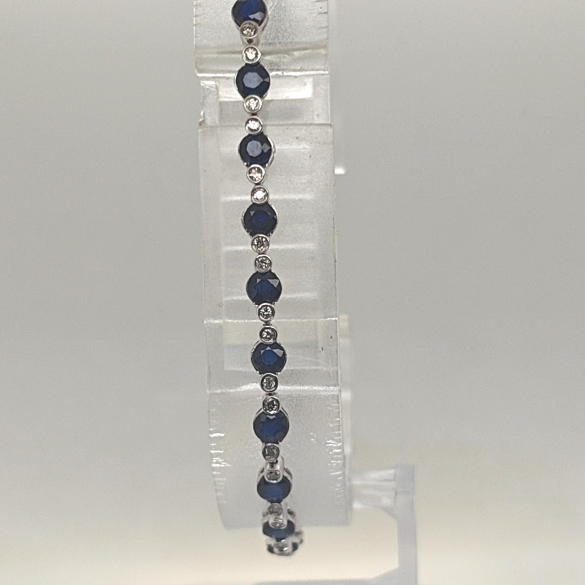 SAPPHIRE AND DIAMOND TENNIS BRACELET WHITE GOLD