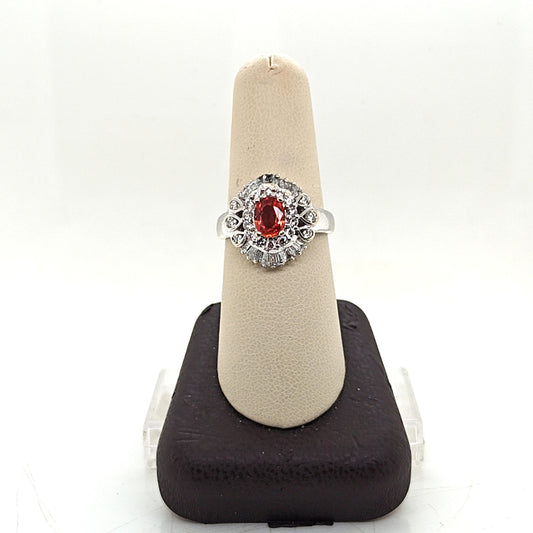 DIAMOND AND ORANGE SAPPHIRE CLUSTER RING WHITE GOLD