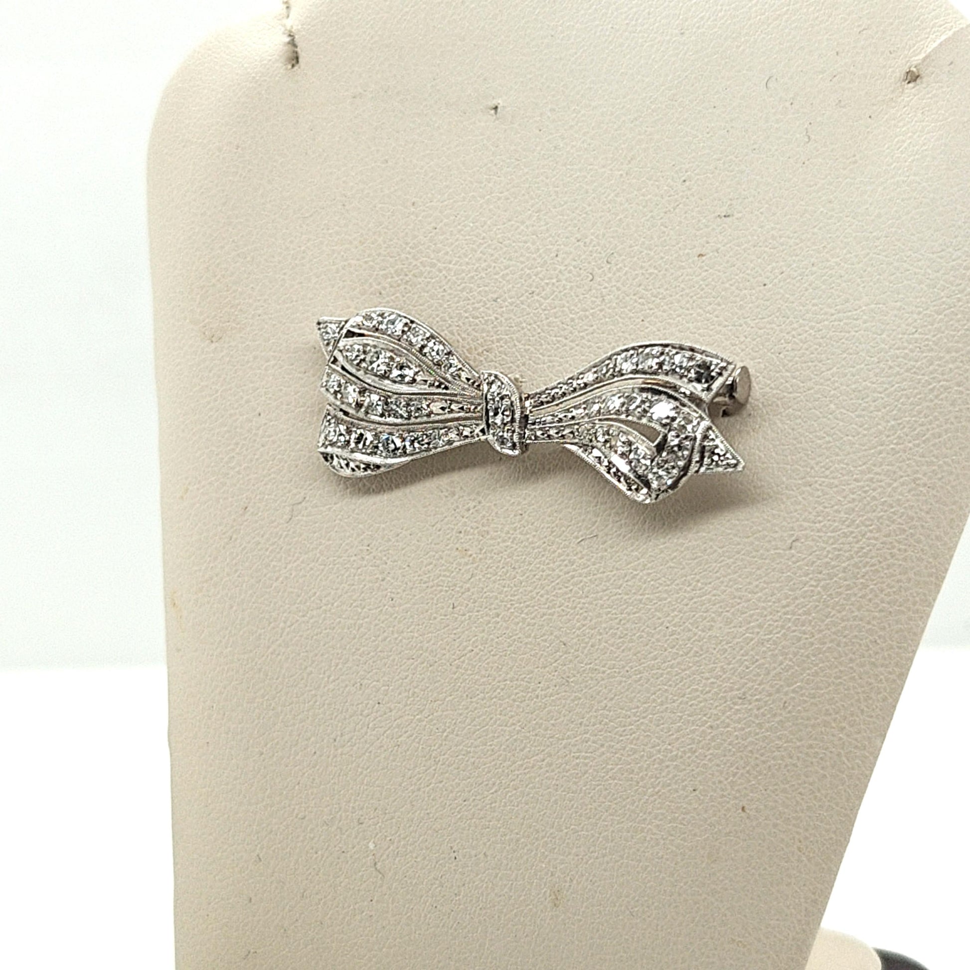VINTAGE ESTATE PLATINUM AND DIAMOND BOW BROOCH PIN