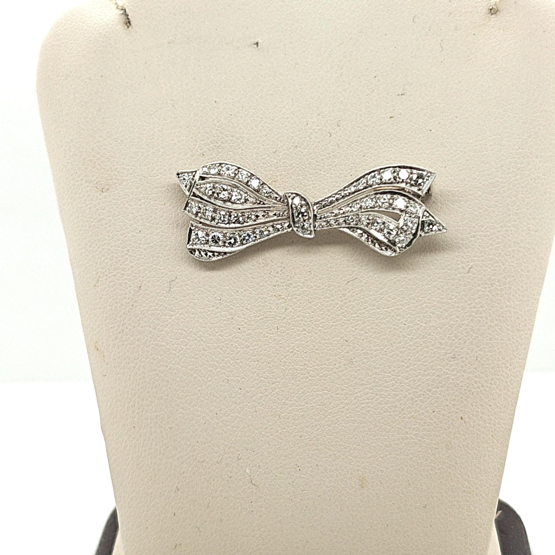 VINTAGE ESTATE PLATINUM AND DIAMOND BOW BROOCH PIN
