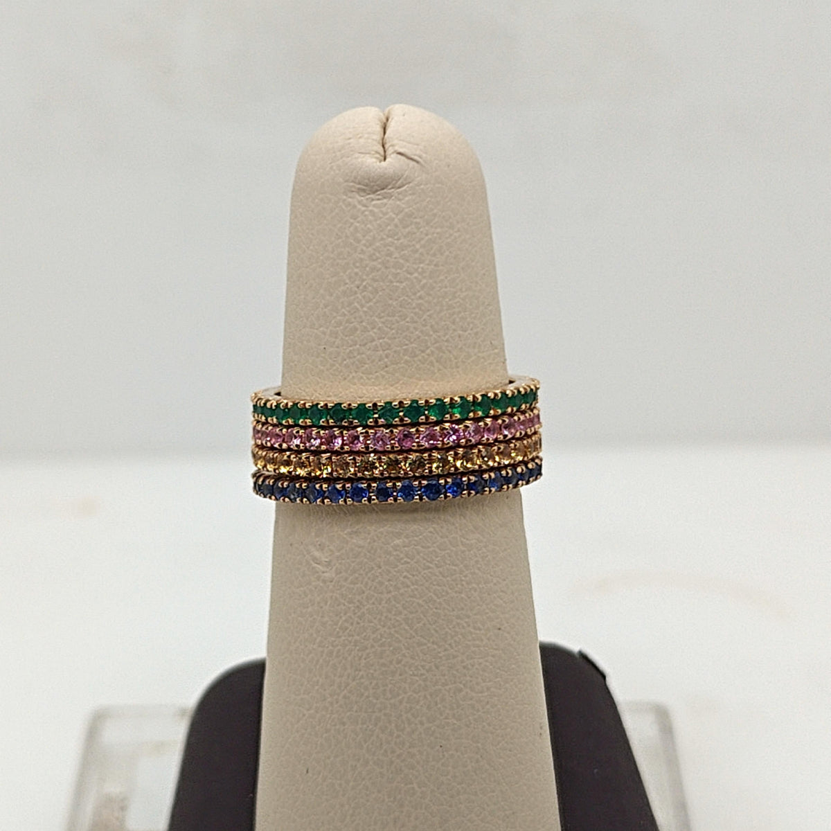 FOUR EMERALD AND SAPPHIRE STACKABLE ETERNITY BAND RINGS YELLOW GOLD