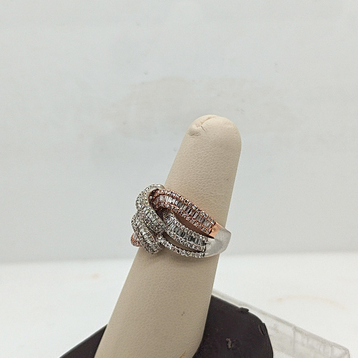DIAMOND SWIRL KNOT 1.75CTW WHITE AND ROSE GOLD BAGUETTE RING