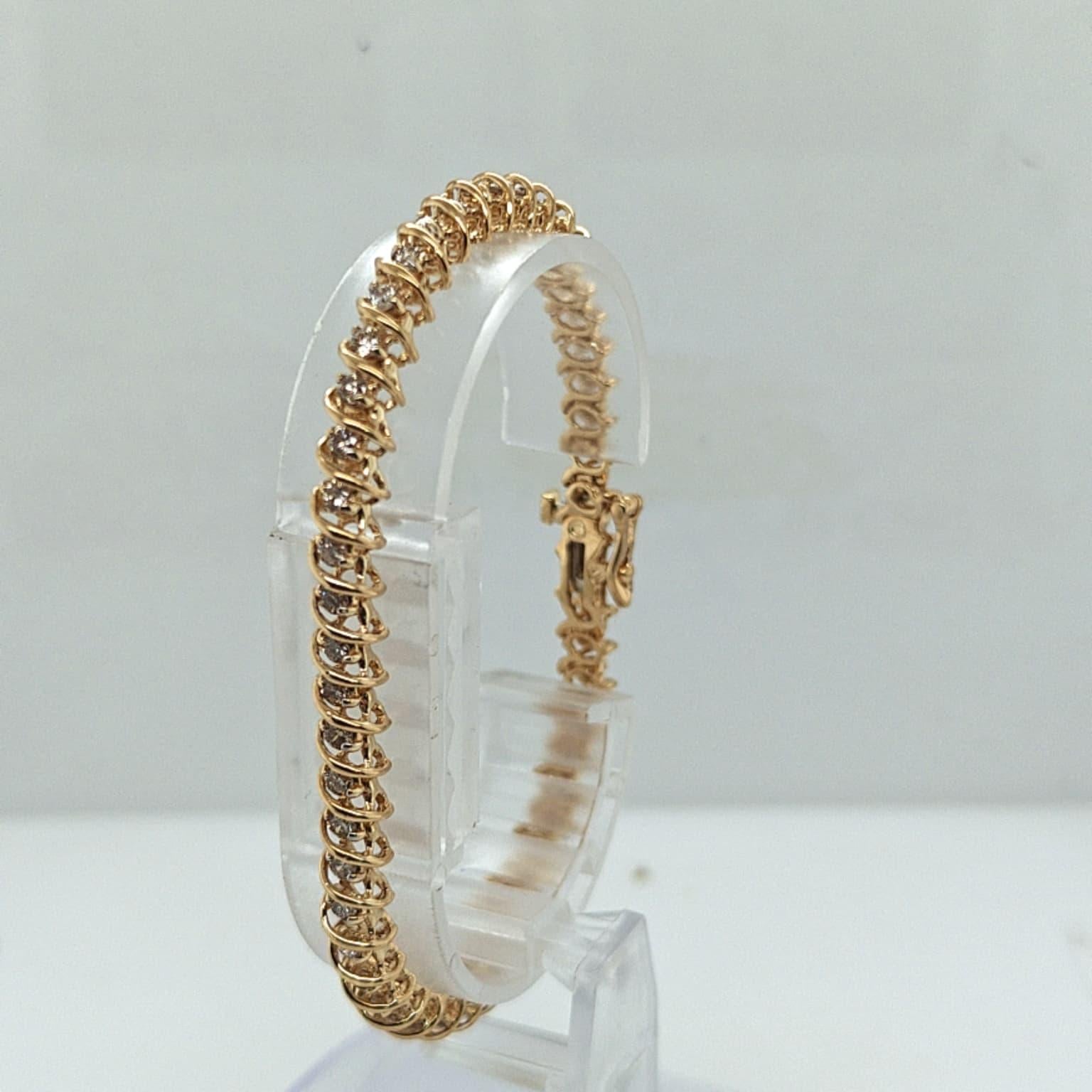 DIAMOND S LINK TENNIS BRACELET 2.05CTW YELLOW GOLD