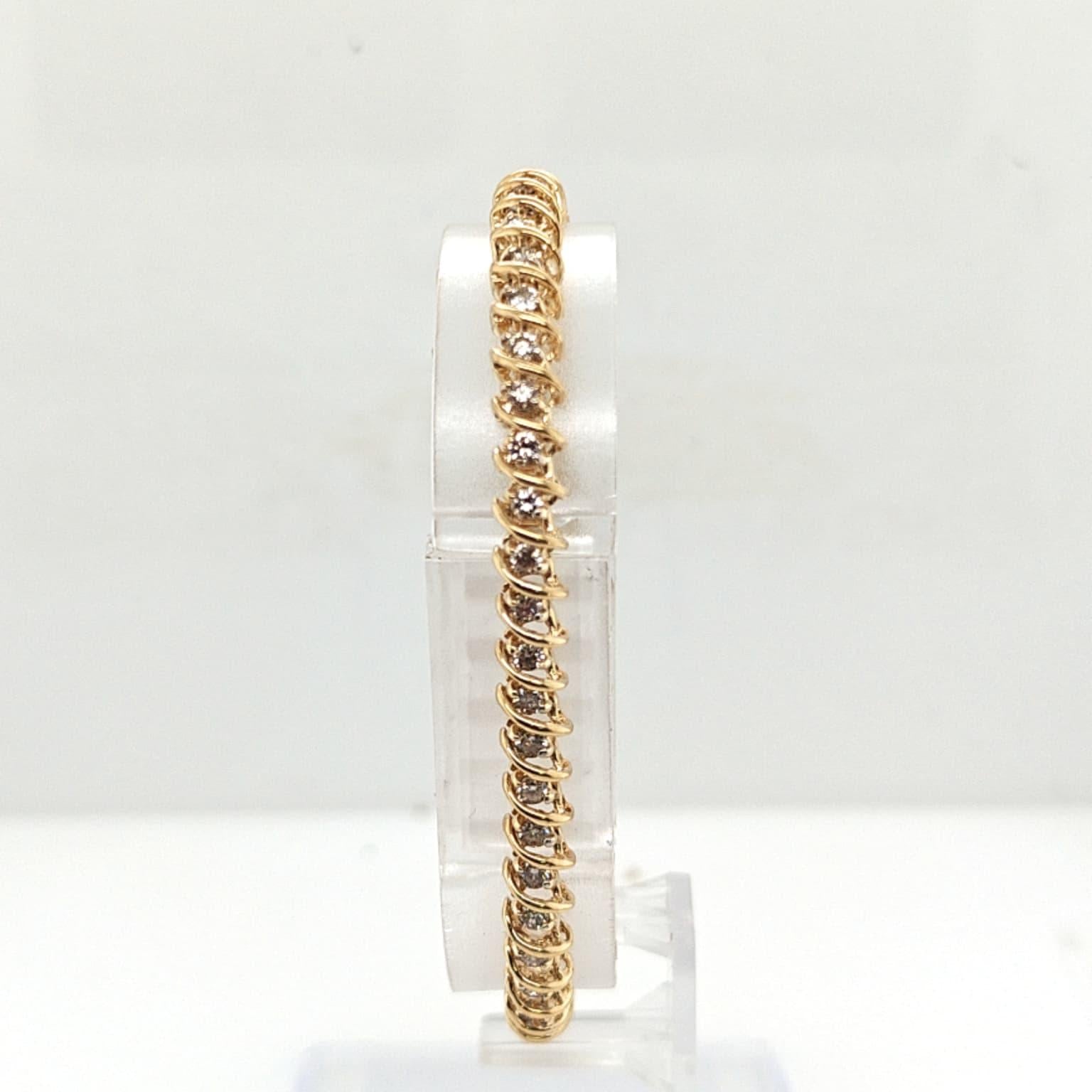 DIAMOND S LINK TENNIS BRACELET 2.05CTW YELLOW GOLD