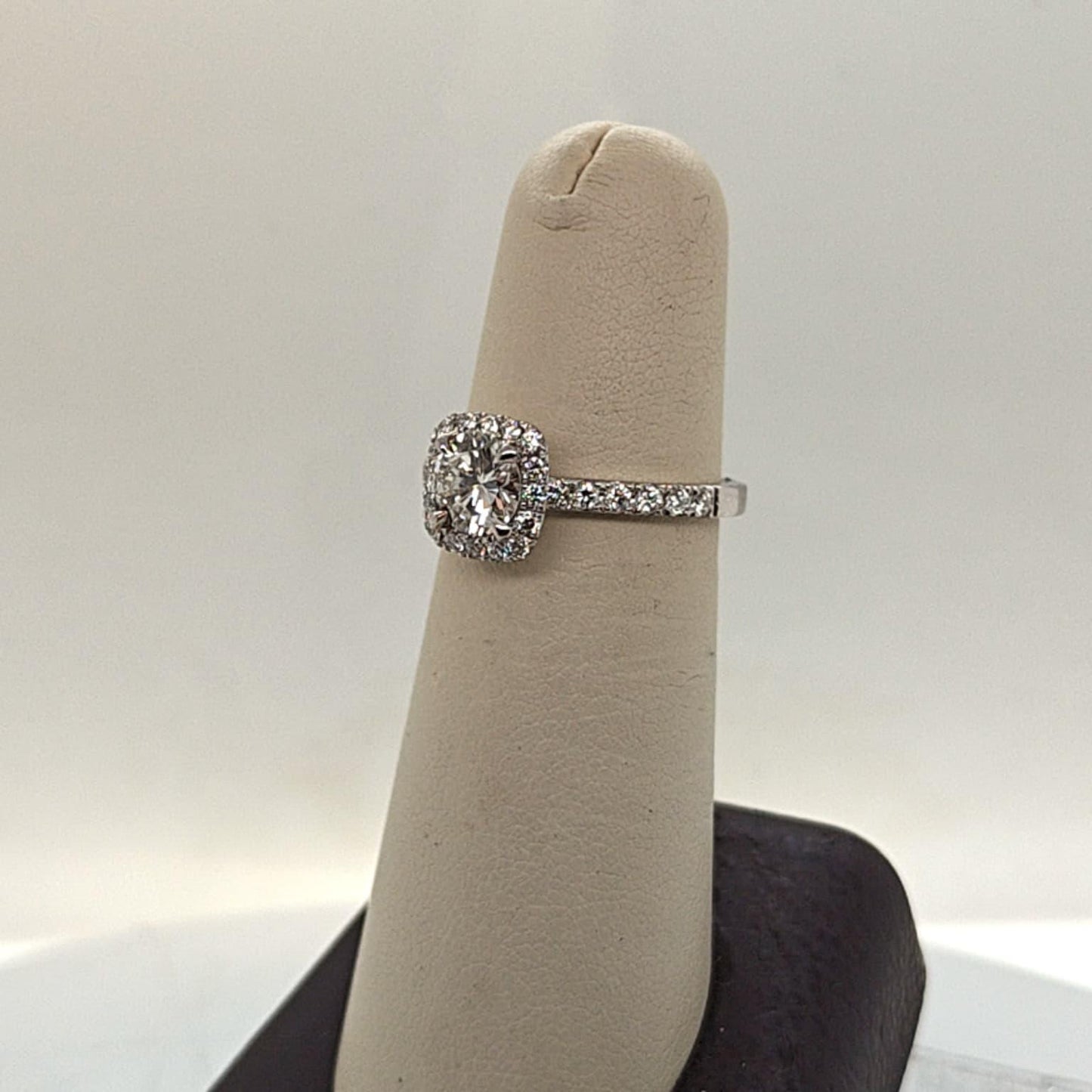 DIAMOND ENGAGEMENT RING  0.79CT WITH A HALO F VVS (GIA) PLATINUM