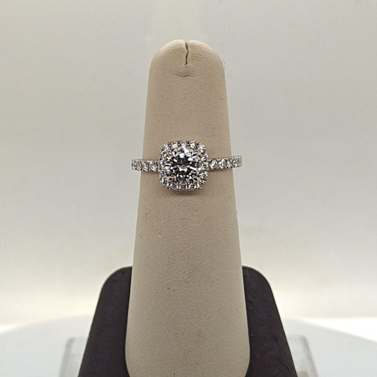 DIAMOND ENGAGEMENT RING  0.79CT WITH A HALO F VVS (GIA) PLATINUM