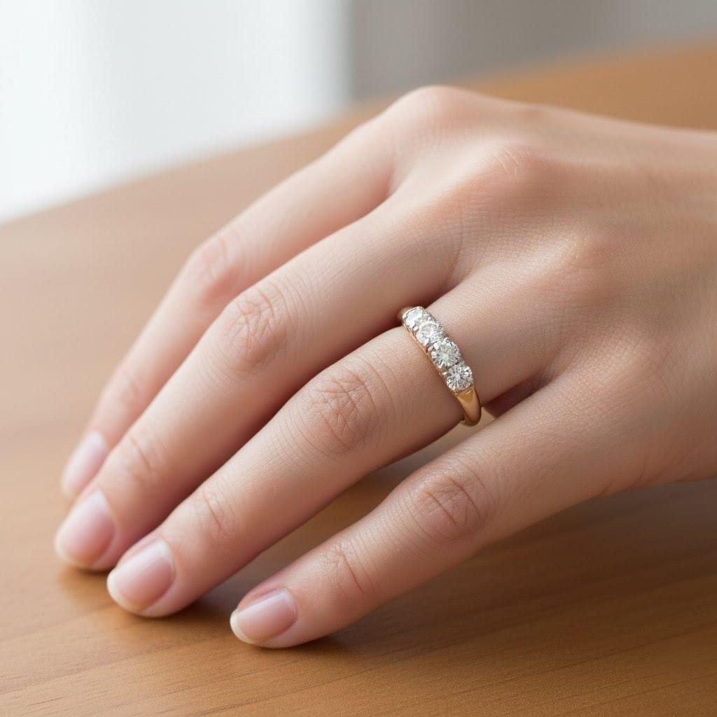 FOUR DIAMOND BAND RING 0.75CTW YELLOW GOLD