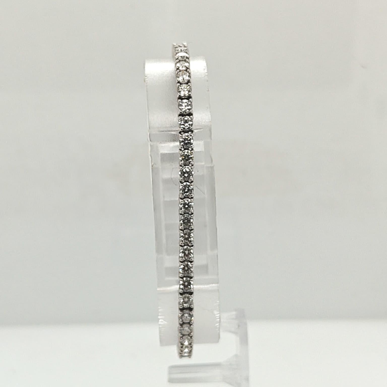 DIAMOND TENNIS BRACELET 5.83CTW WHITE GOLD