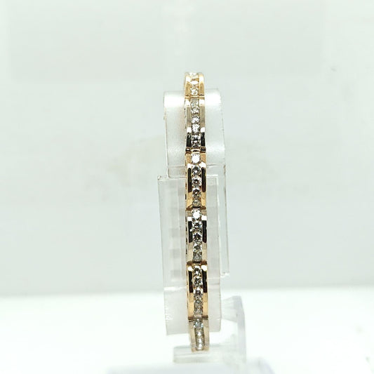 DIAMOND BRACELET 5.02CTW CHANNEL SET TWO TONE GOLD