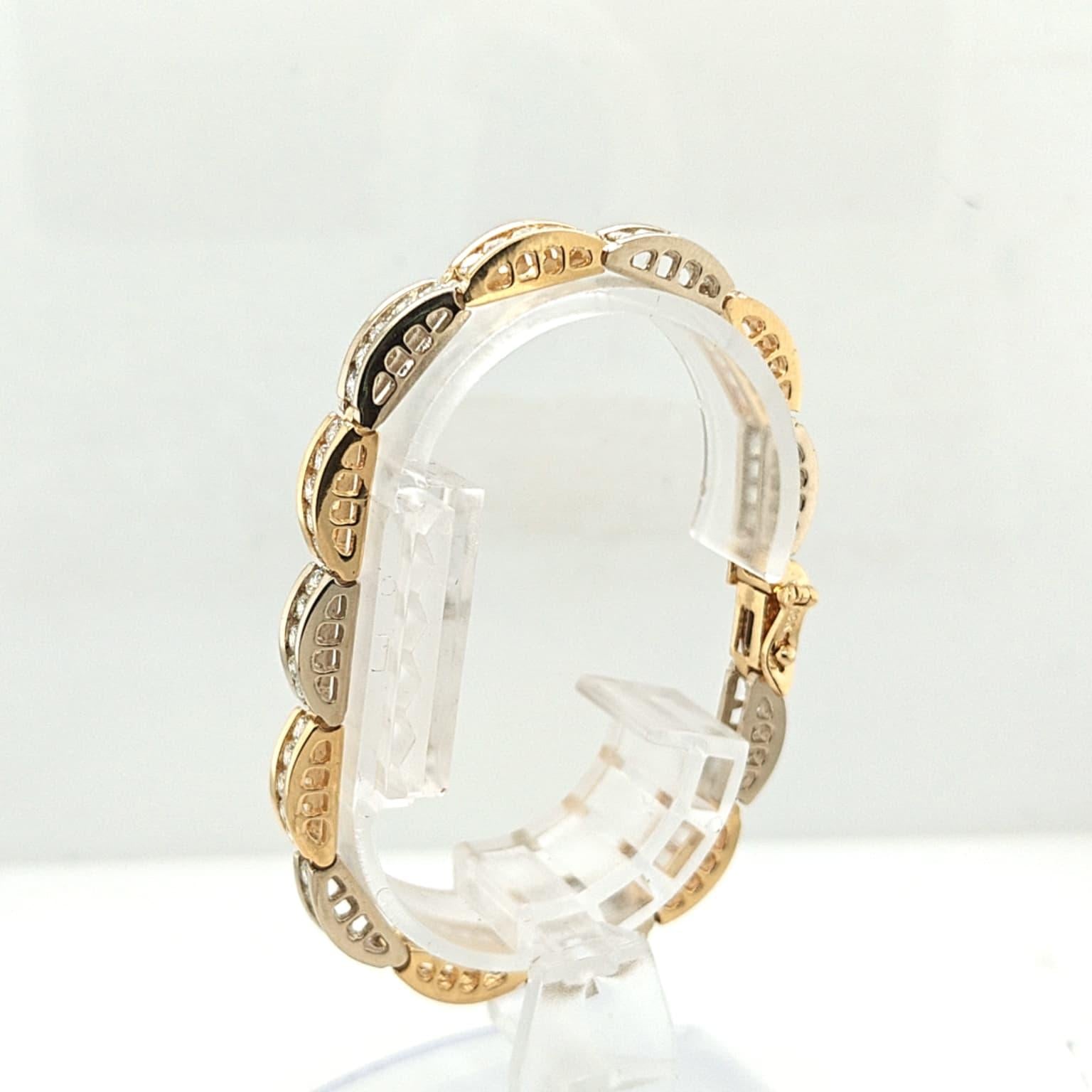 DIAMOND BRACELET 5.02CTW CHANNEL SET TWO TONE GOLD