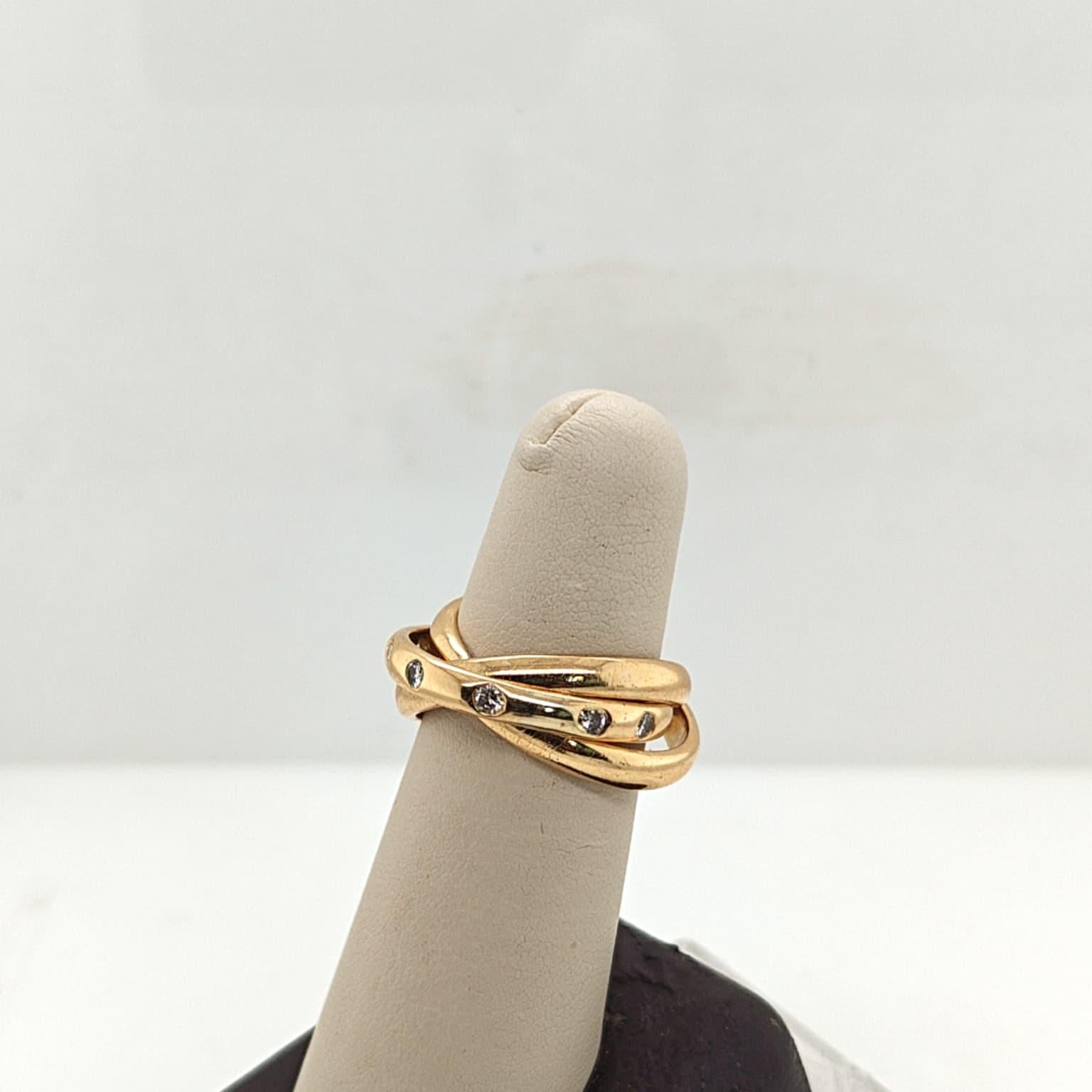 DIAMOND ROLLING THREE RING 0.60CTW YELLOW GOLD