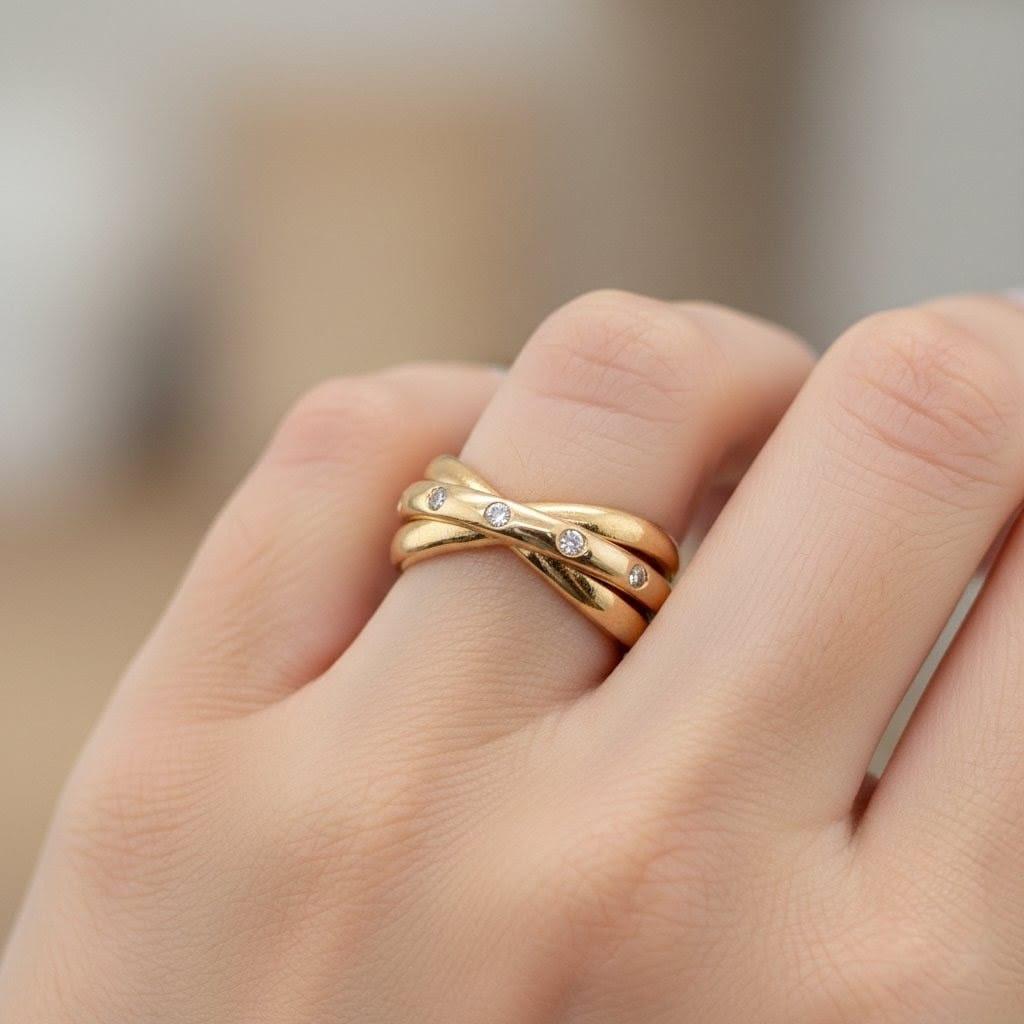 DIAMOND ROLLING THREE RING 0.60CTW YELLOW GOLD
