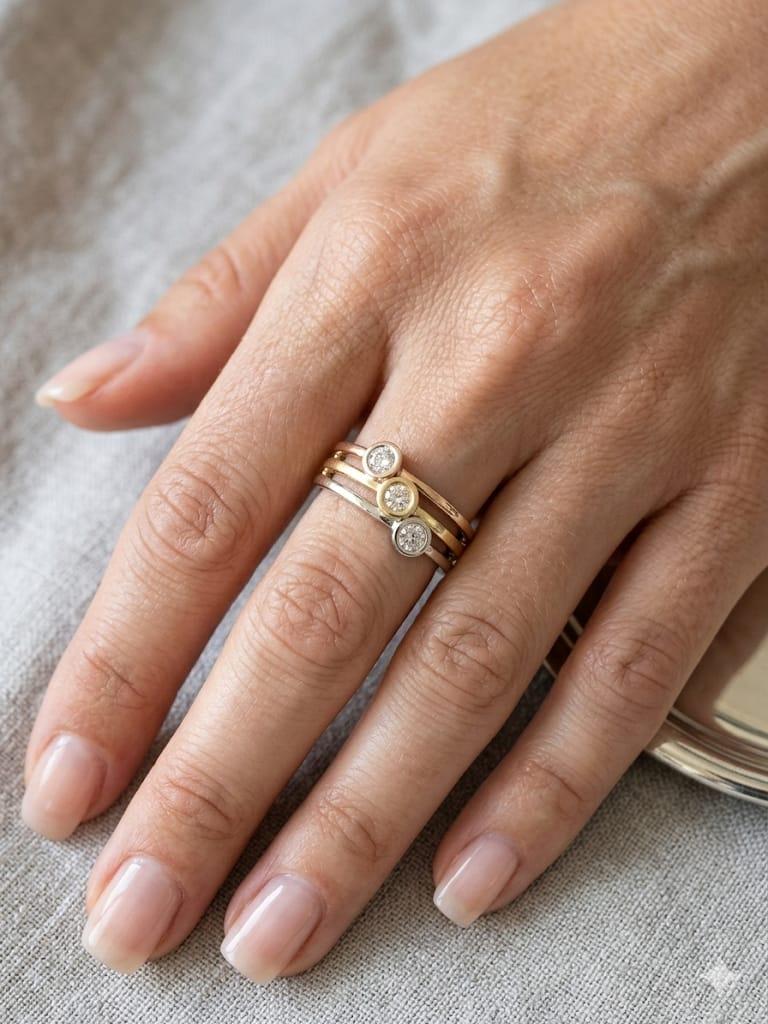 THREE DIAMOND RING 0.45CTW TWO TONE GOLD