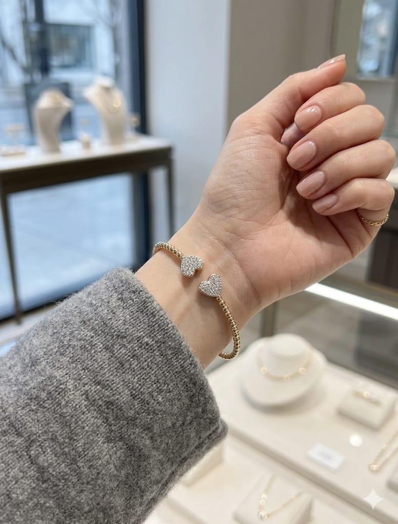 FLEXIBLE BEAD BANGLE CUFF BRACELET WITH DIAMOND HEART ENDS YELLOW GOLD