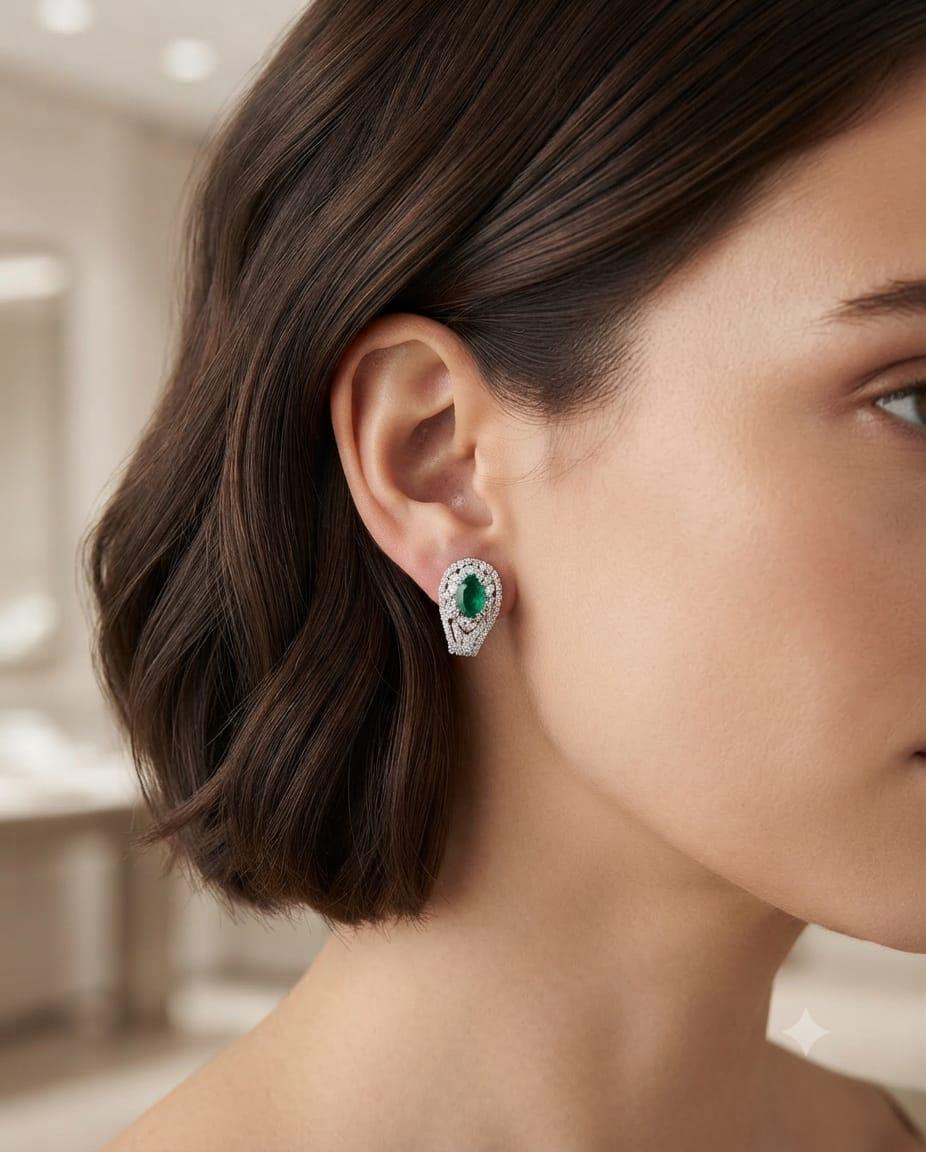 DIAMOND AND OVAL EMERALD EARRINGS WHITE GOLD
