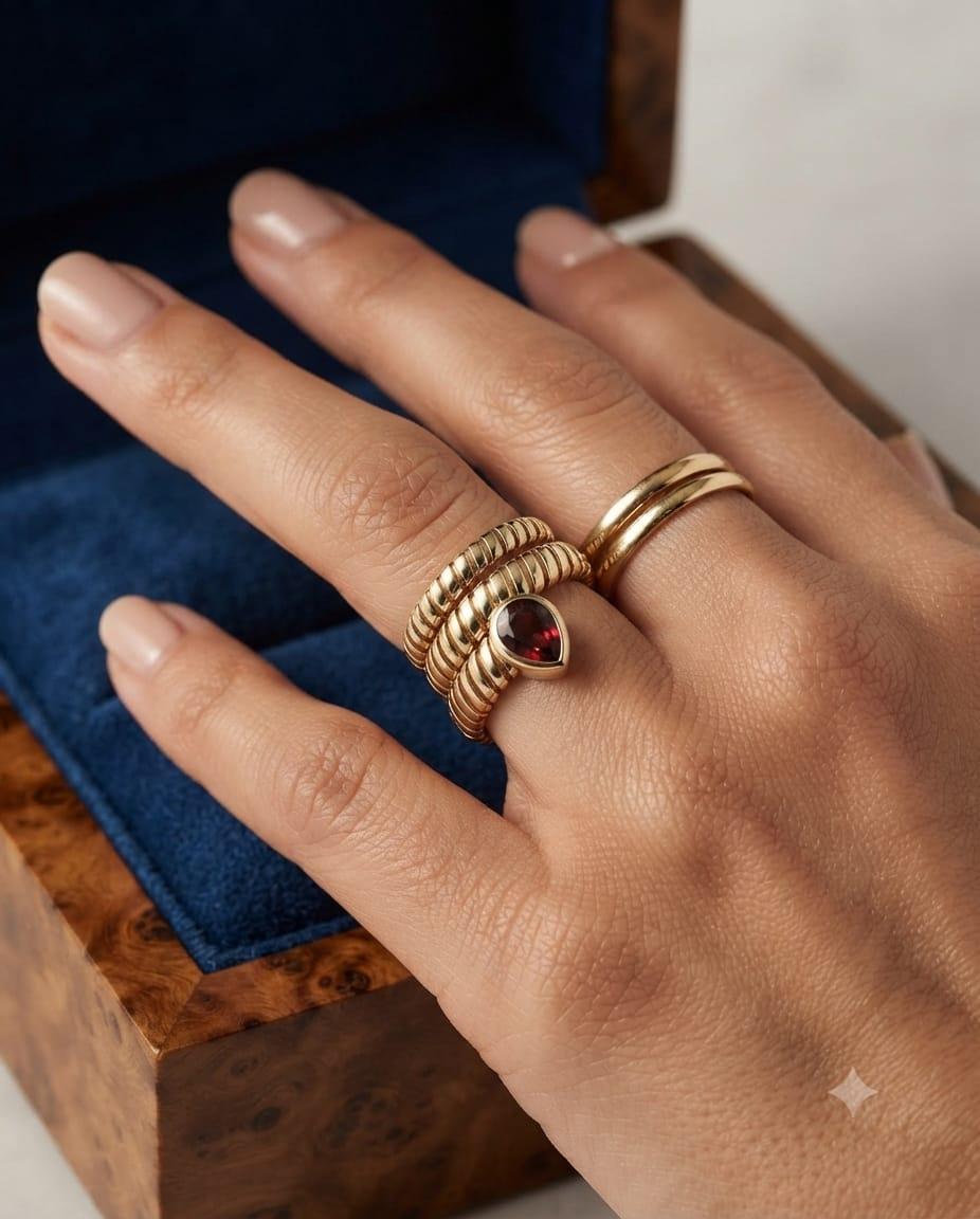 VINTAGE STYLE TUBOGAS COILED SERPENTINE RING WITH PEAR CUT GEM YELLOW GOLD