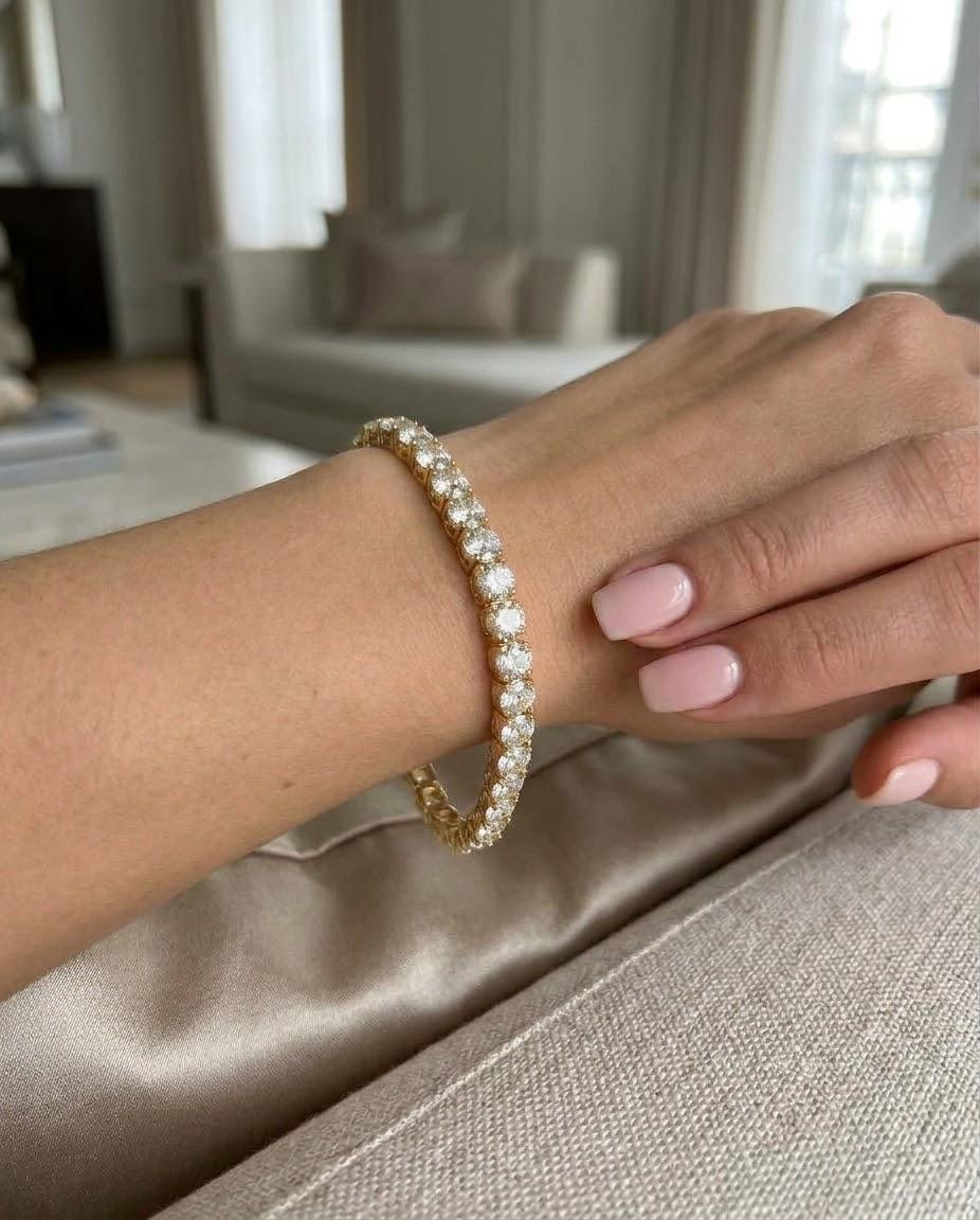 DIAMOND TENNIS BRACELET 6.75CTW YELLOW GOLD