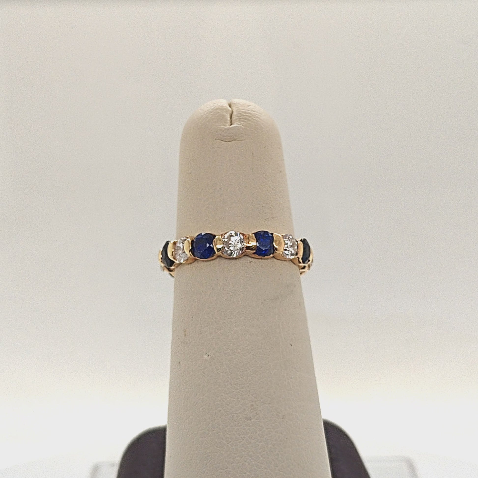 DIAMOND AND SAPPHIRE ETERNITY BAND RING YELLOW GOLD